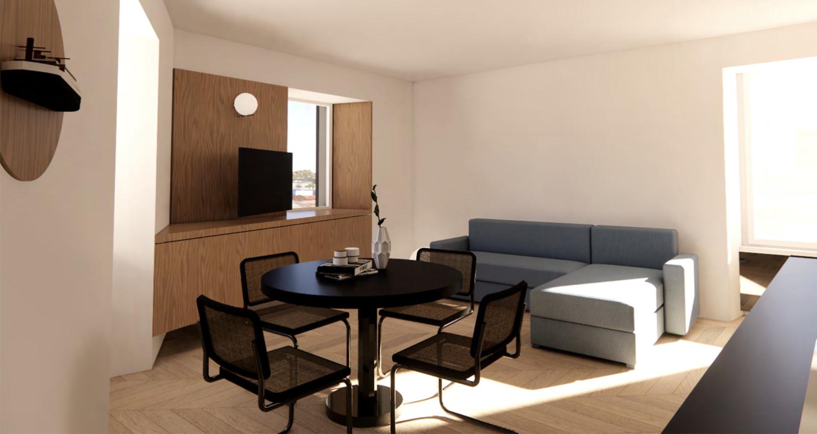 Bright modern living room with black table and blue sofa, cozy atmosphere.