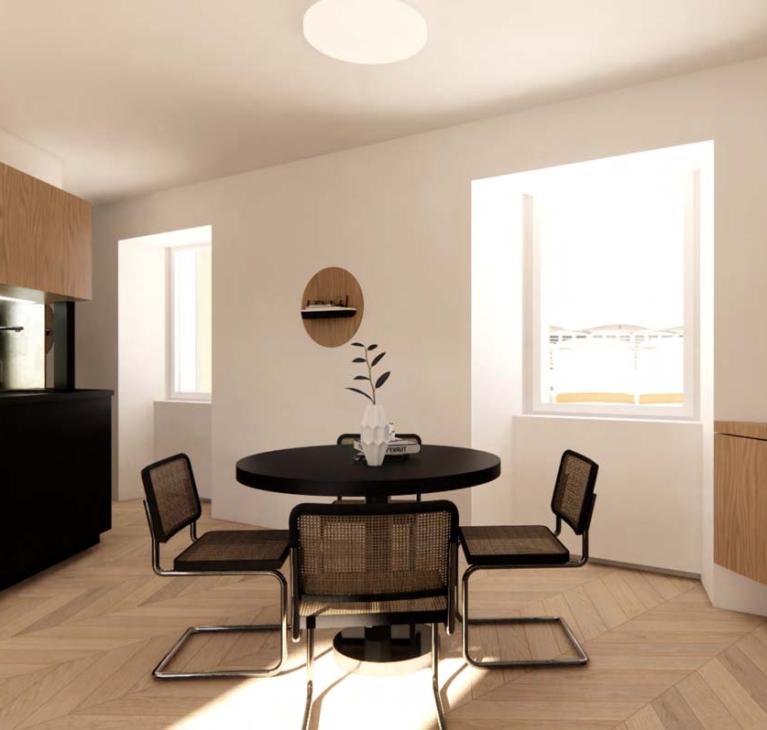 Modern, bright, cozy kitchen with a round table and elegant chairs.