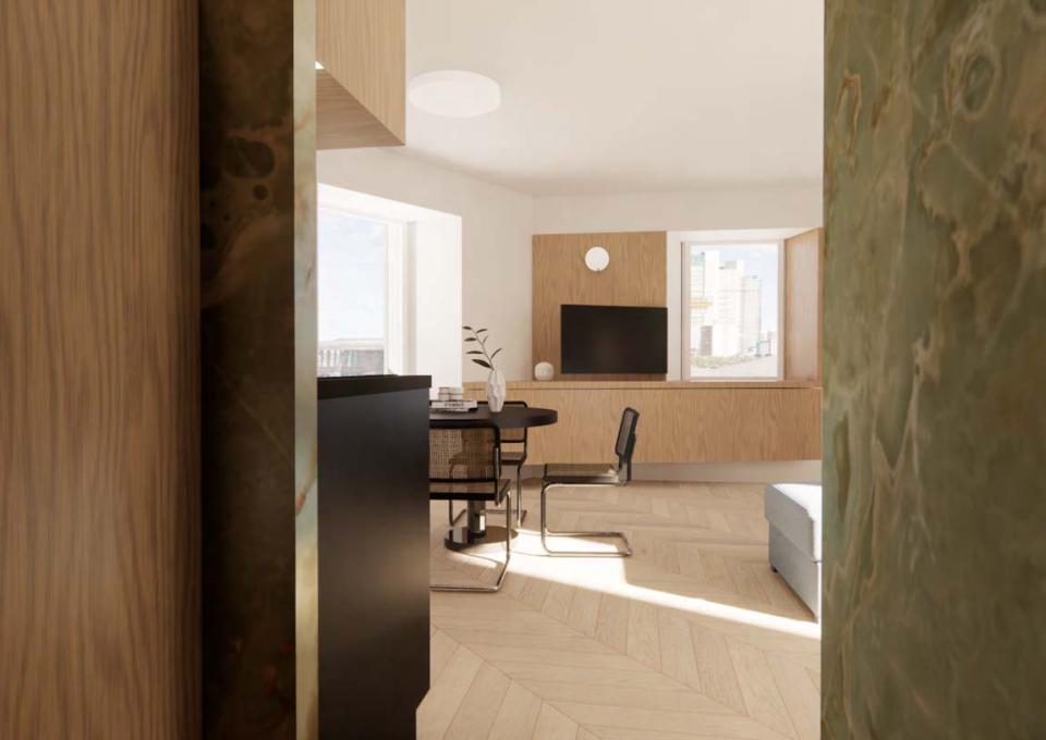 Bright, modern interior with wooden furniture and city view.